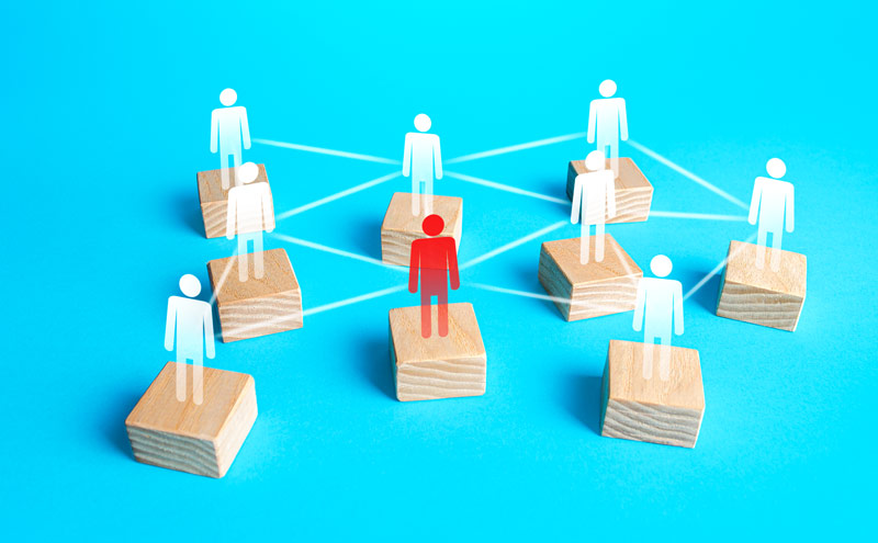 One red stick person illustration connected to the rest